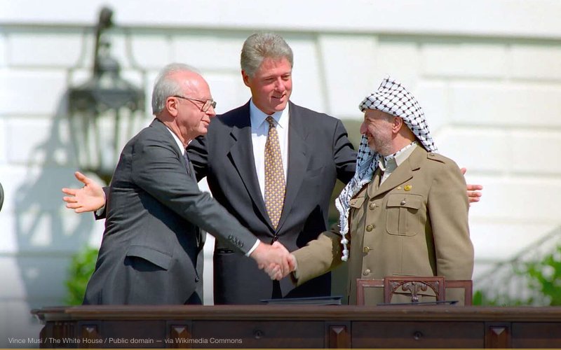 Israeli Prime Minister Yitzhak Rabin, U.S. president Bill Clinton, and PLO chairman Yasser Arafat. — related to The Clinton Body Count