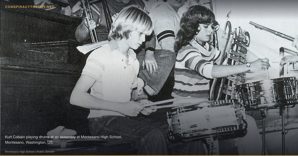 Courtney Love Had Kurt Cobain Killed (1994) — Kurt Cobain playing drums at an assembly at Montesano High School, Montesano, Washington, US.