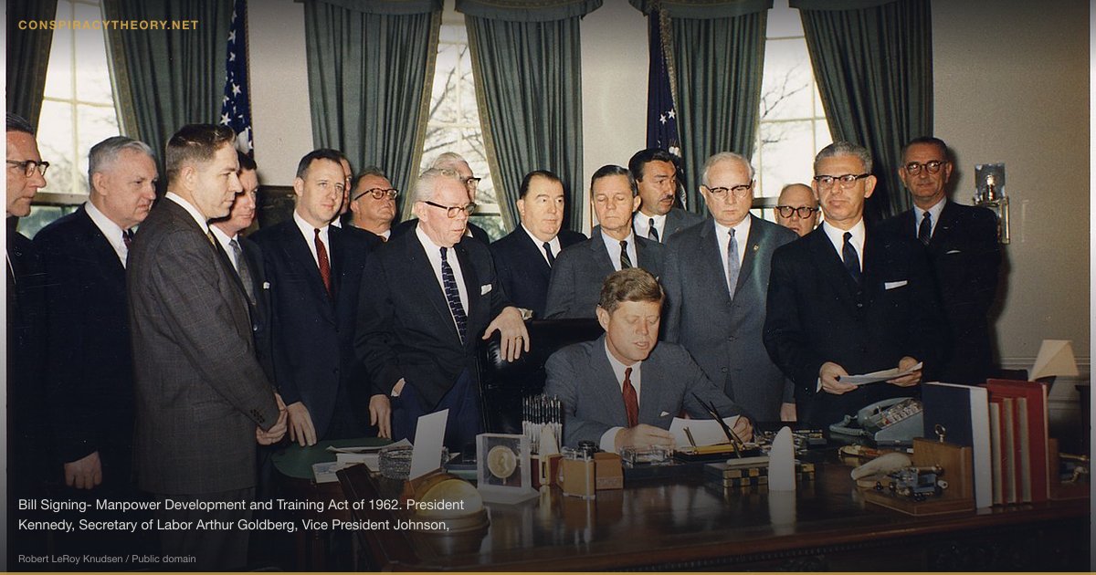 JFK Assassination Conspiracy Theories (1963) — Bill Signing- Manpower Development and Training Act of 1962. President Kennedy, Secretary of Labor Arthur Goldberg, Vice President Johnson, George Meany, Senator Jennings Randolph, Senator Joseph Clark, Representative Adam Clayton Powell, others. White House, Oval Office