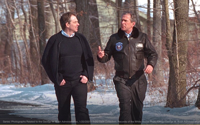 President George W. Bush and Prime Minister Tony Blair of the United Kingdom, walk a path at Camp David Feb. 23, 2001, during the Prime Minister's visit. Photo by Eric Draper, Courtesy of the George W. Bush Presidential Library and Museum — related to 7/7 London Bombings Conspiracy