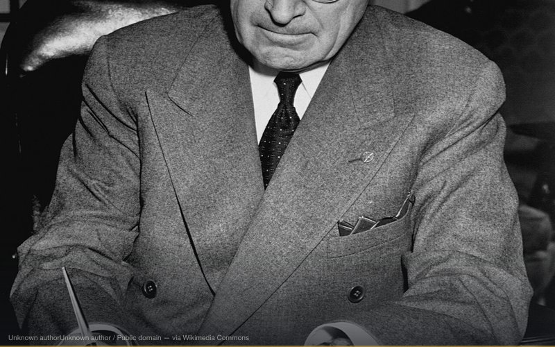 President Harry S. Truman is shown at his desk at the White House signing a proclamation declaring a national emergency — related to Majestic 12 — Alleged Secret Alien Government Committee
