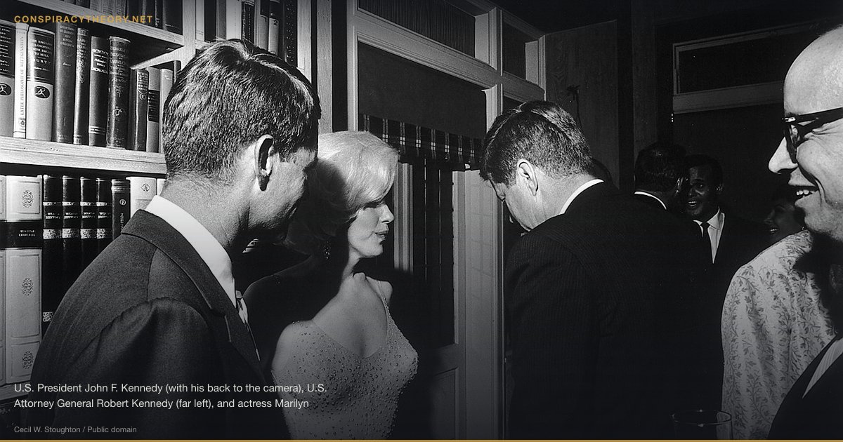 Marilyn Monroe Was Murdered (1962) — U.S. President John F. Kennedy (with his back to the camera), U.S. Attorney General Robert Kennedy (far left), and actress Marilyn Monroe, on the occasion of President Kennedy's 45th birthday celebrations at Madison Square Garden in New York City. Arthur M. Schlesinger is at the far right. Facing the camera in the rear is singer Harry Belafonte.